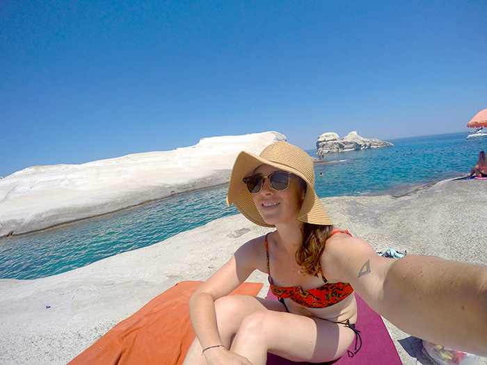 Enjoying those white rocks and blue water at Sarakiniko Beach // Nattie on the Road