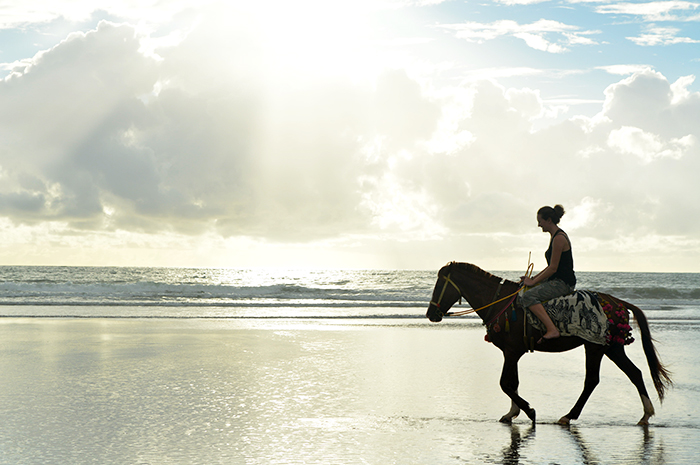 horse back riding on the beach in Myanmar