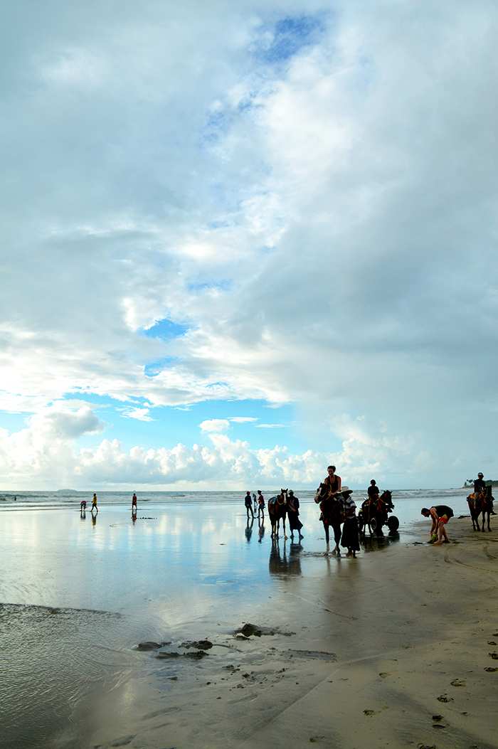 riding horses on the beach in Myanmar
